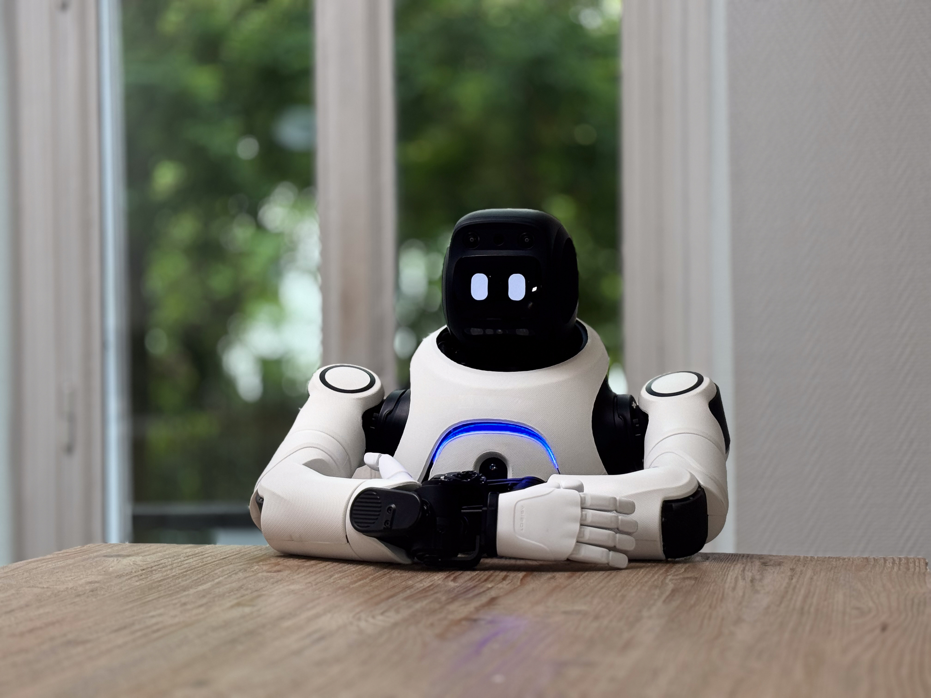 Botifull humanoid robot sitting on a ledge, blue background